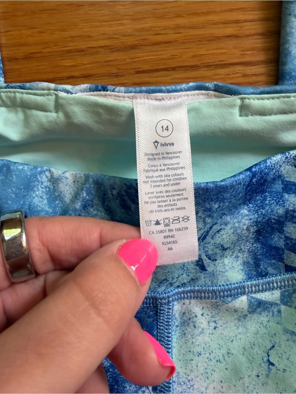Ivivva blue and green patterned leggings size 14